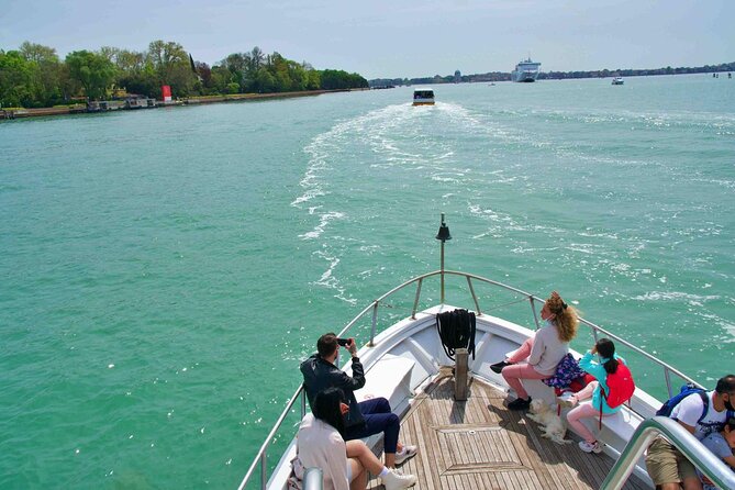 from Venice: Murano and Burano afternoon tour - Boat comfort, seating, and the reality of a busy pier