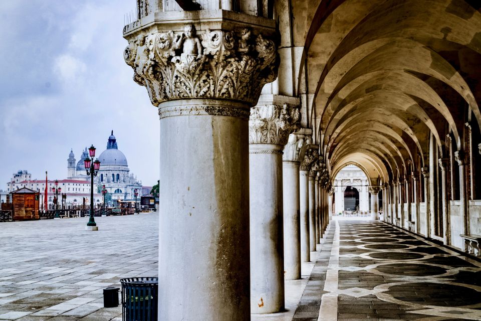 Venice: 1-Hour The Doge's Palace Tour - The Doge’s Palace courtyard and Golden Staircase: where the palace flexes