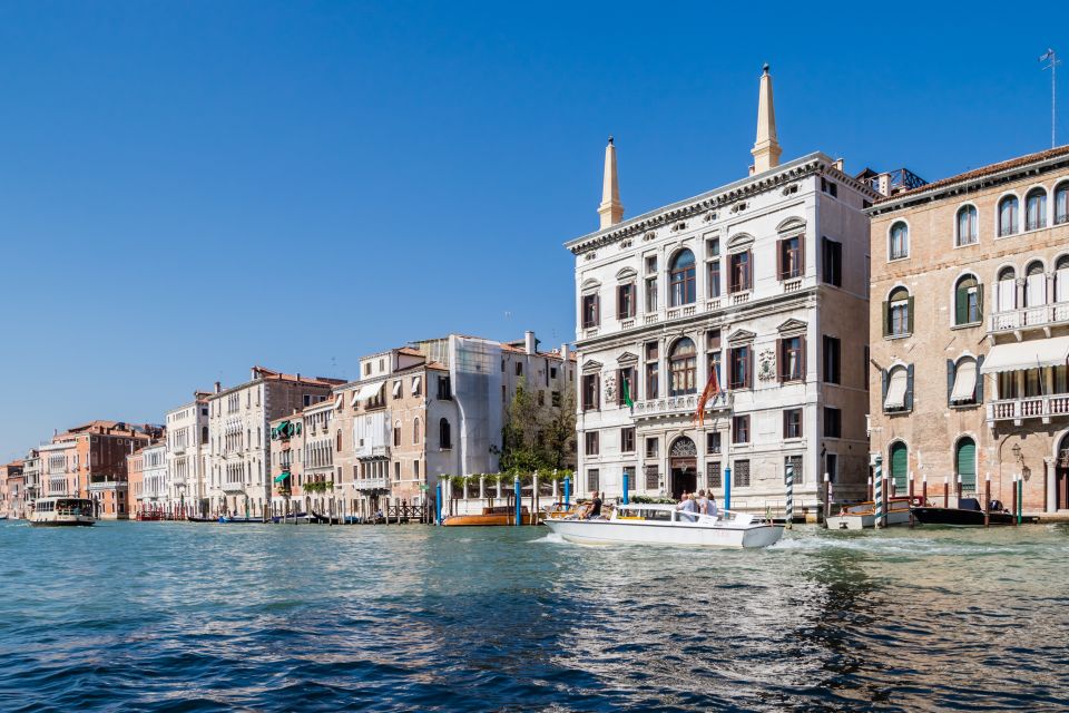 Venice: Shared Gondola Ride Across the Grand Canal - Rialto Bridge: iconic area, but don’t assume under-bridge views