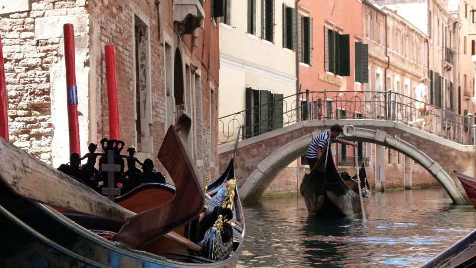 Venice: Shared Gondola Tour - Off the usual tourist route: minor canals, bridges, and mansion-like facades